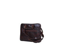 A dark brown, leather-like messenger bag
