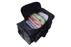 A black duffel bag is centered in the image.