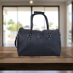 A black, duffel-style travel bag