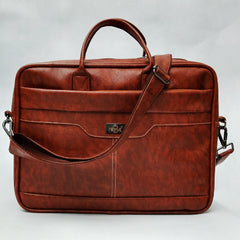 A brown leather-like laptop bag or briefcase