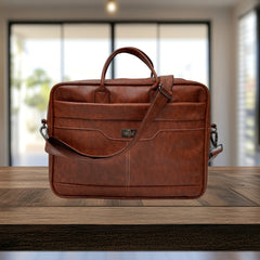 A brown leather-like laptop bag or briefcase