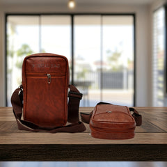 A brown, faux-leather crossbody bag