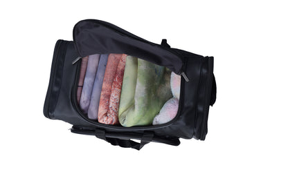 A black duffel bag is centered in the image.