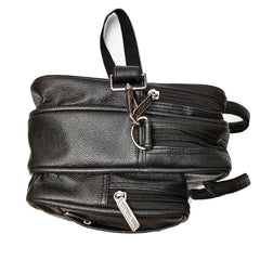 A black leather messenger bag sits