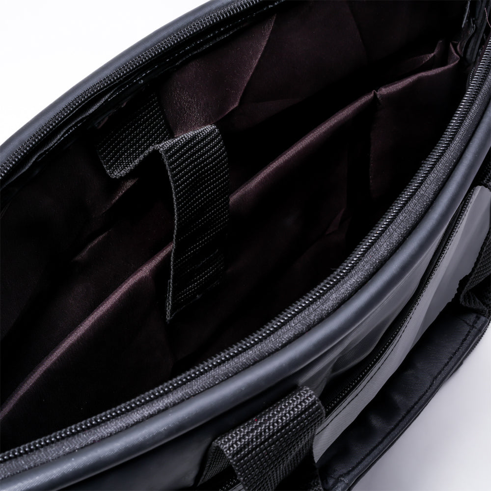 Full shot of a black briefcase-style bag.
